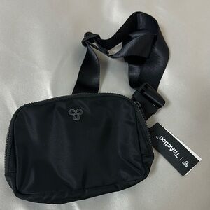 Black Belt Bag with Adjustable Strap and Compact Design